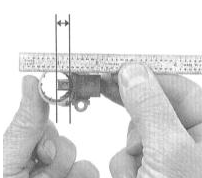 4. Измерьте длину выступания каждой из щеток из своего патрона в держателе и